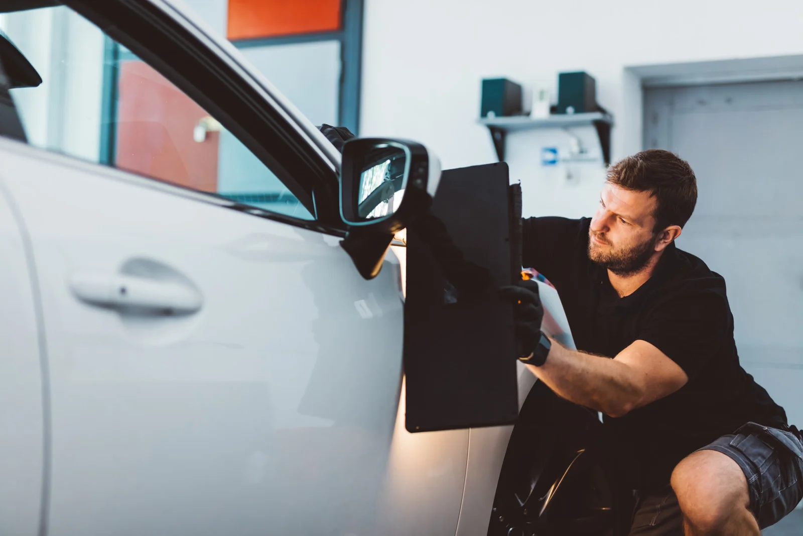 Mobile SMART repair on a vehicle with dent removal